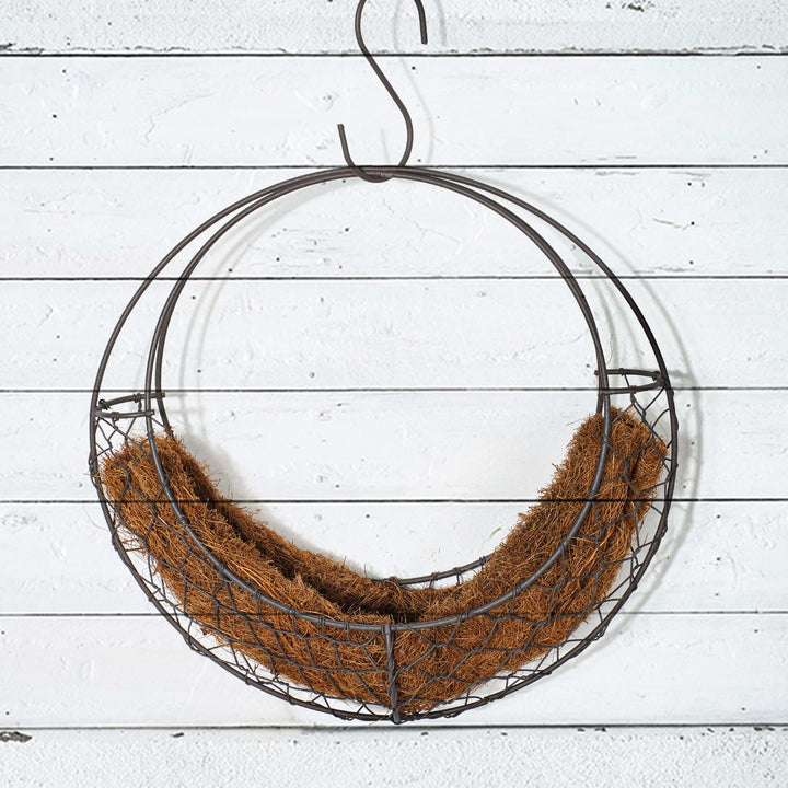 moon-shaped-iron-succulent-hanging-planter-is-hanging-on-the-wall.